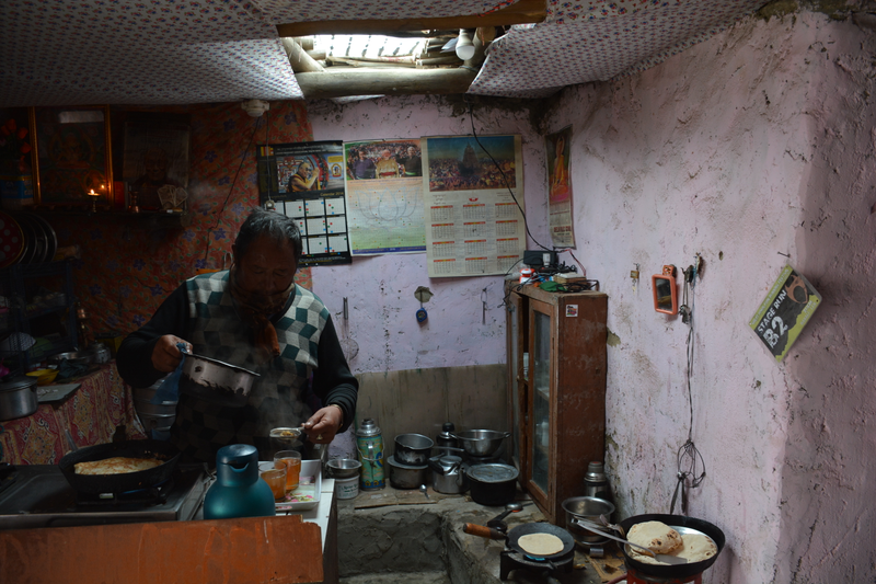 A man prepares food inside a dhaba